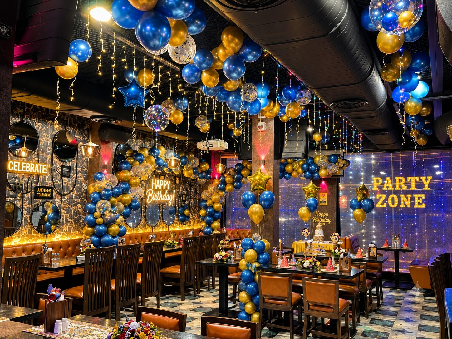 Big Bull Cafe premium interior view showing warm timber tones ambient pendant lighting and plush seating in the main dining hall at Chakala Andheri East Mumbai